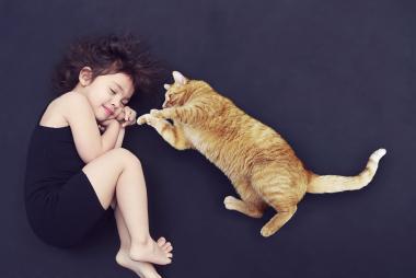 sleeping girl and cat